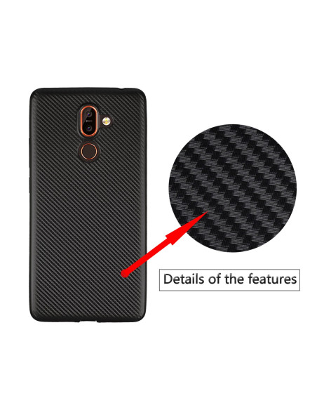 Detaljvy av det svarta stöttåliga skalet med mönstrad yta för Nokia 7 Plus