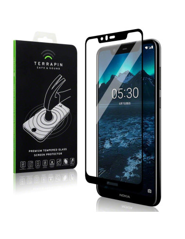 Nokia 5.1 Plus härdat glas monterat på telefon med förpackning i bakgrunden