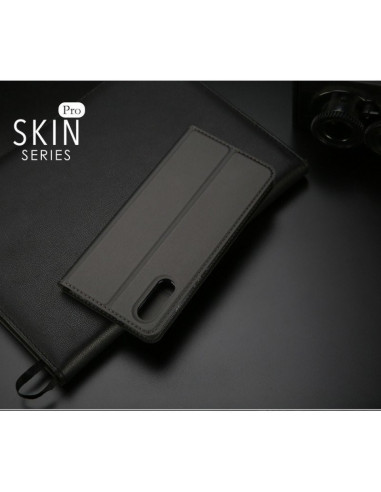 Detaljvy av Xiaomi Mi 10 flipfodral i svart konstläder, stängt med kortfack synligt