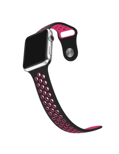 Sportarmband i svart och rosa för Apple Watch, visat från sidan med ventilationshål