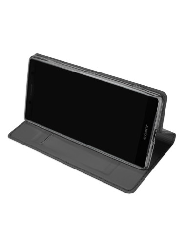 Svart flipfodral för Xperia XZ2 Compact, stående med telefonen monterad och kortfacket synligt