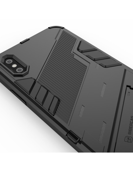 Detaljvy av iPhone X/XS stöttåligt skal med kickstand, sett snett bakifrån som visar texturen