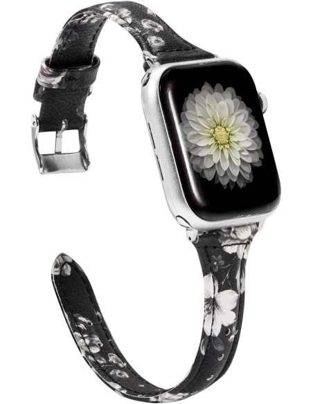 Svart läderarmband med vit blomma på en Apple Watch, visad från en vinkel