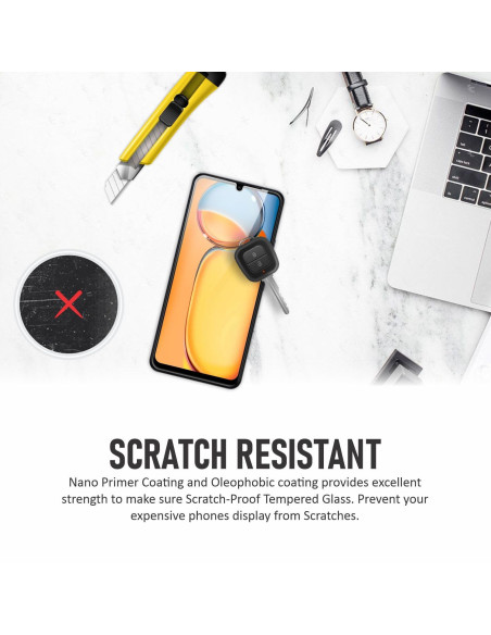 Xiaomi Redmi 13C 4G härdat glas, visat med telefon och verktyg på en skrivbordsyta